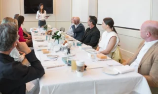 Business Trip by Day, Rooftop Dinner by Night: The Spray Tan Prep for Professionals Traveling to Major Events